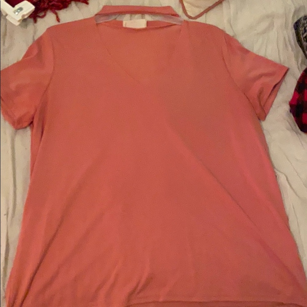 pink blouse with cutout